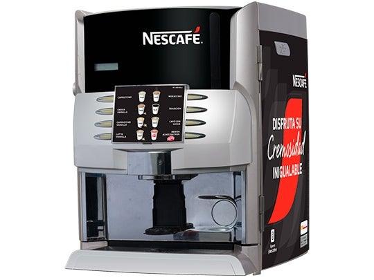 Máquina Nescafé Prima Premix con un diseño minimalista, con pantalla táctil y ofrece una variedad de bebidas calientes.